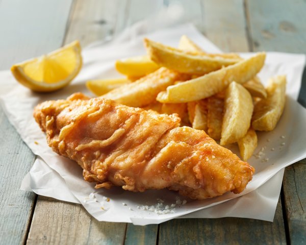 Crispy Fried Fish Fillet with Seasoned Fries and Lemon