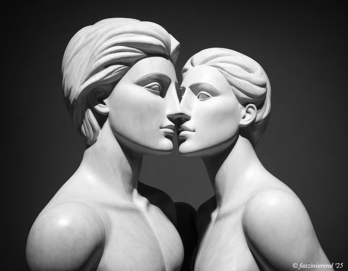Black and White Sculpture of Intimate Figureheads
