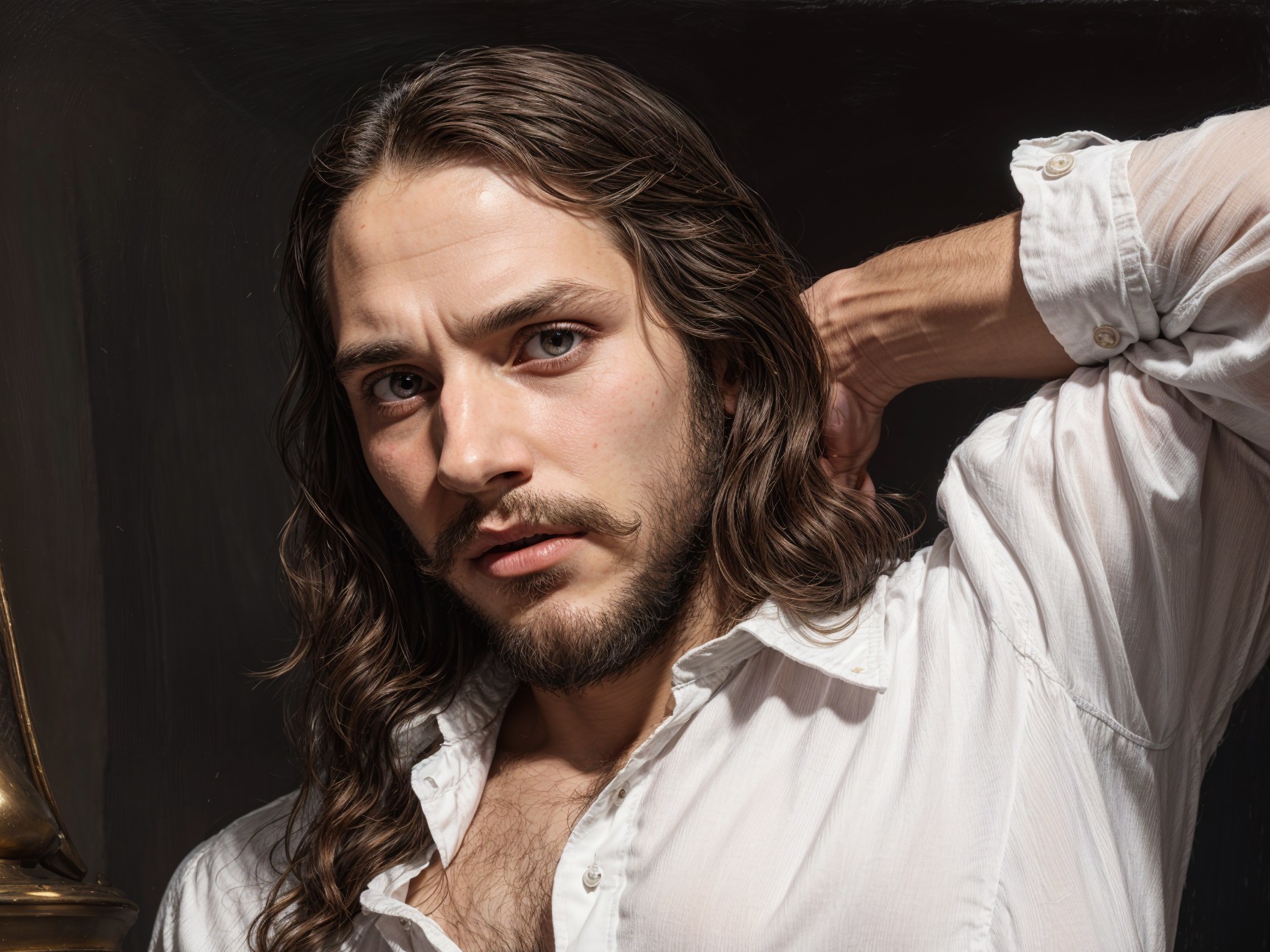 Young man with long hair and contemplative expression