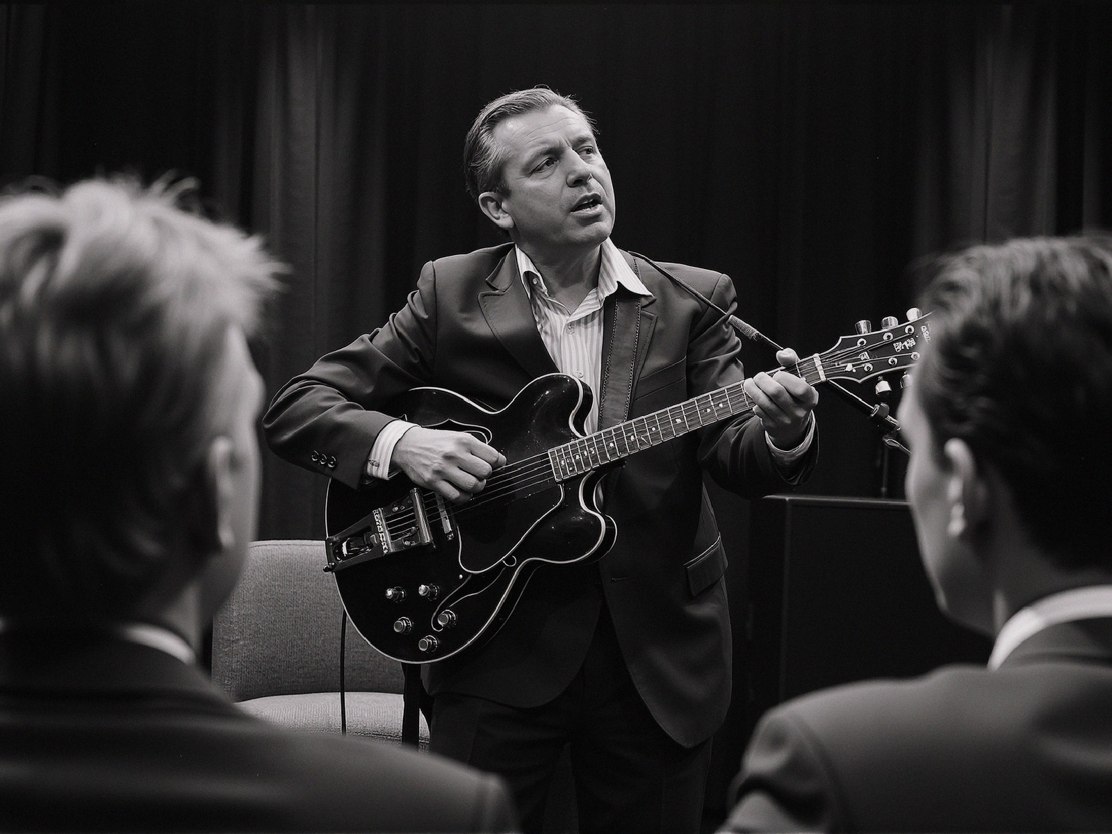 Man in Suit Performing Emotionally with Acoustic Guitar