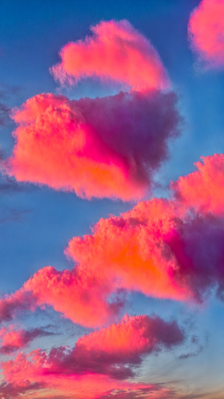 Vibrant Twilight Sky with Colorful Clouds and Blue Backdrop