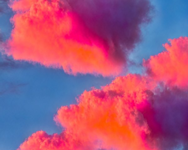 Vibrant Twilight Sky with Colorful Clouds and Blue Backdrop