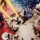 Playful Cat in Vibrant Cosmic Background with Laser Eyes