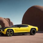 Yellow Supercar in Desert with Red Rock Formations