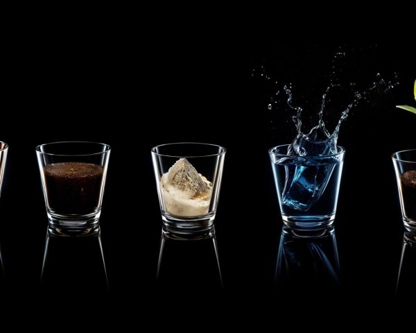 Five Glasses with Diverse Materials on Black Background