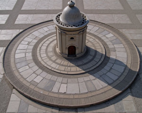 Circular Stone Structure on Patterned Plaza