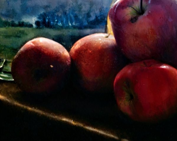 Close-up of Red Apples on Wooden Surface with Light