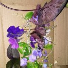 Stylized figure of a woman in patterned garment