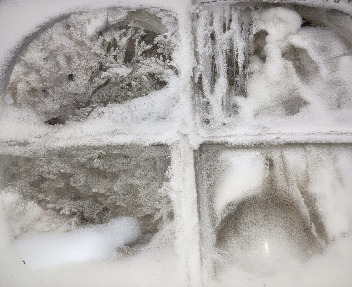 Frosted Windowpane with Winter Landscape Details