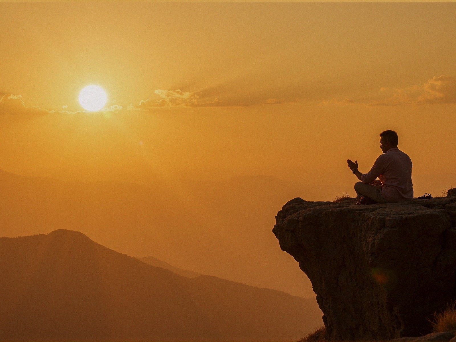 Meditation at Sunset on a Rocky Ledge
