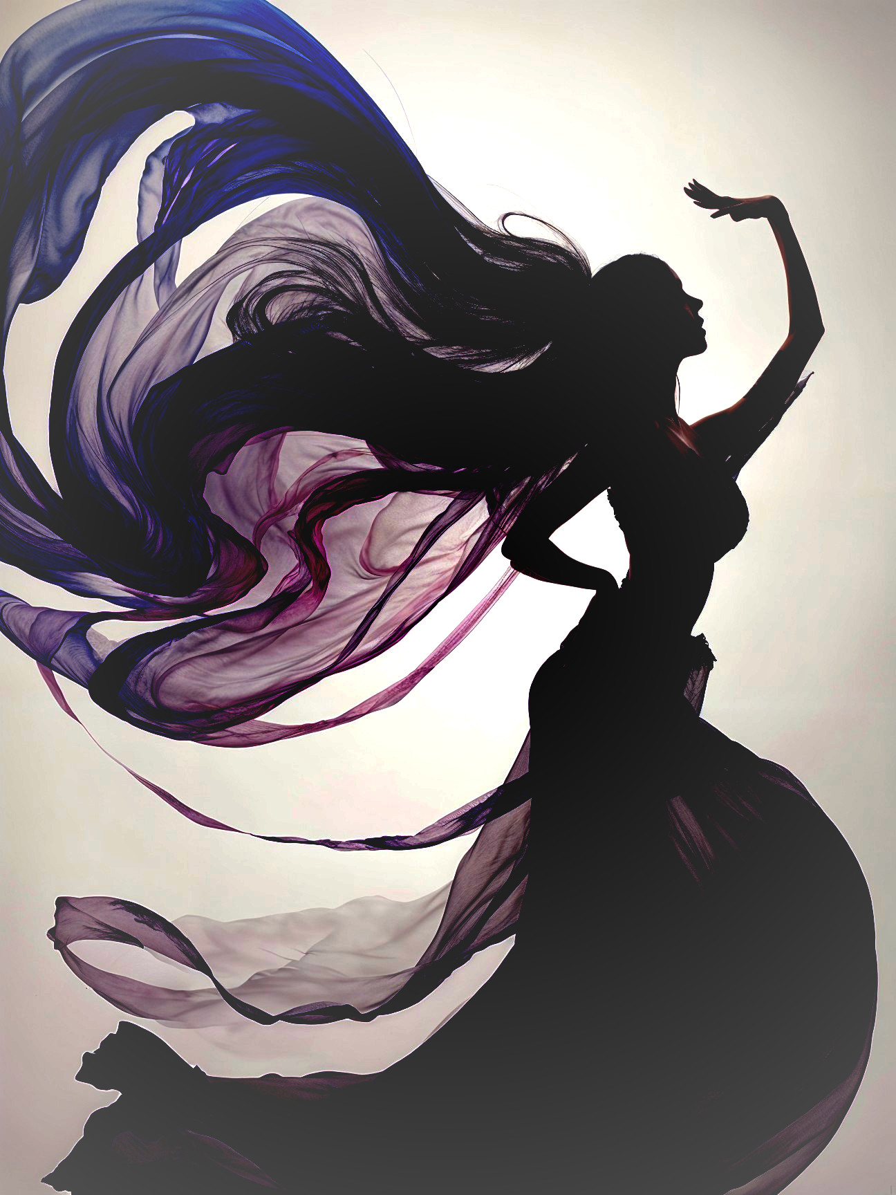 Silhouette of a Woman in Flowing Purple and Blue Fabrics