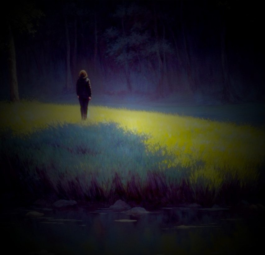 Solitary Figure by Glowing Grassy Bank in Forest