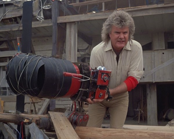 Man with Cannon on Wooden Platform in Creative Setting