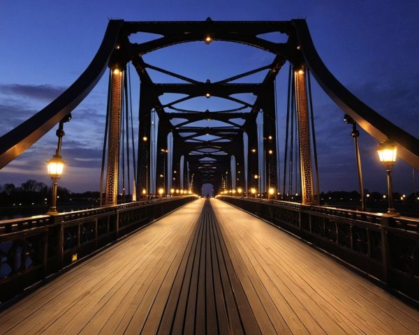 Illuminated Bridge at Twilight with Arches and Lamps