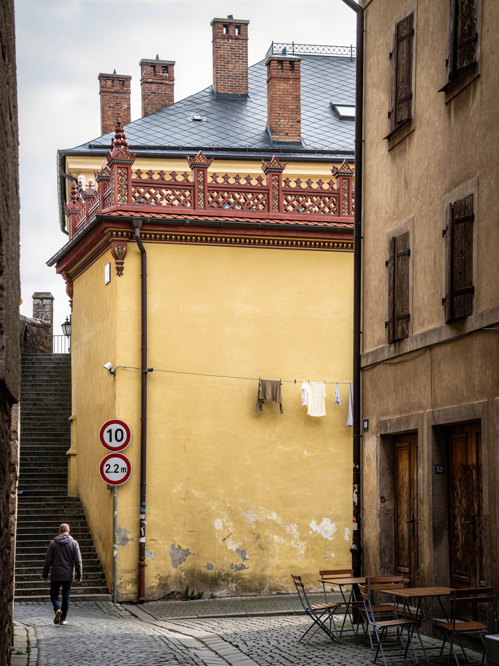 Cobblestone Street with Ornate Buildings and Security Cameras
