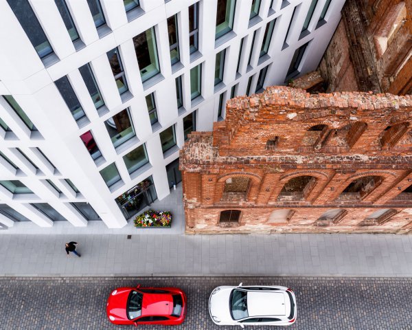 Aerial View of Modern and Ruined Buildings Side-by-Side