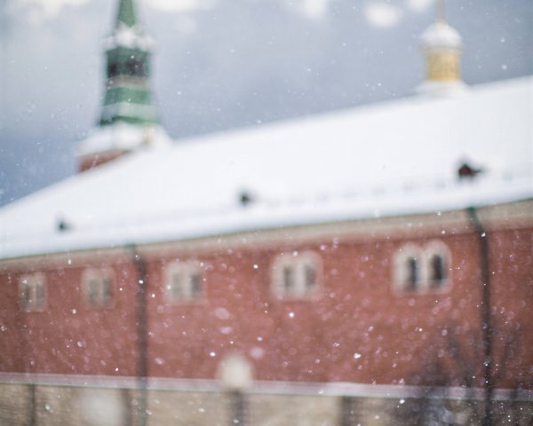 Blurry Low Angle View of Snow-Covered Building