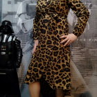 Leopard Print Trench Coat with Futuristic Cityscape