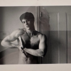 Stylized Male Figure in Gray with Abstract Backdrop