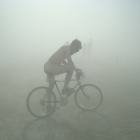 Cycling Artwork Featuring Racer on Dreamlike Landscape