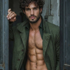 Man in Green Leather Jacket with Chiseled Physique