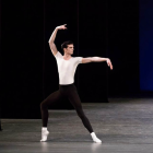 Male dancer in expressive pose with glowing sneakers