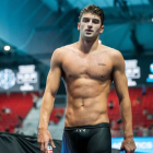 Muscular Young Man in Abstract Colorful Background