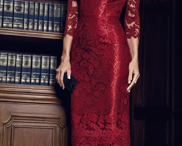 Elegant Woman in Red Lace Dress in Library Setting