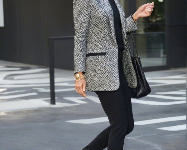 Stylish Woman in Chic Outfit Against Urban Backdrop
