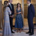 Elegant Group in Luxurious Interior with Evening Attire