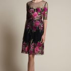 Stylish Woman in Floral Black Dress and Heels