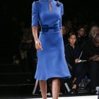 Model in Vibrant Blue Dress with Fitted Silhouette