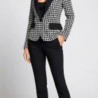 Confident Woman in Stylish Black-and-White Outfit