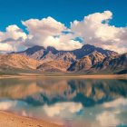 Serene Mountain Landscape with Turquoise Lake Reflection