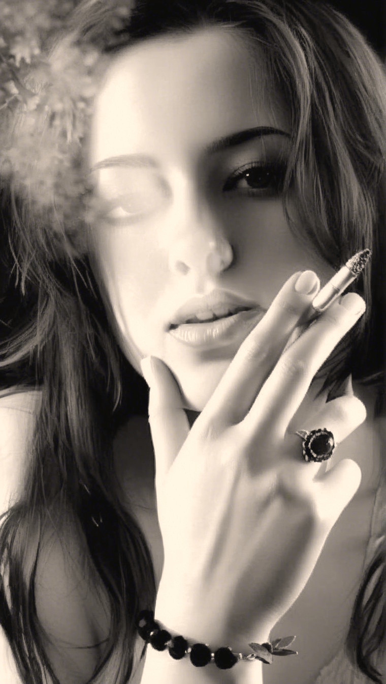 Black-and-white portrait of a contemplative woman