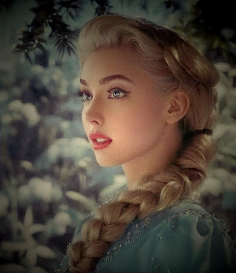 Young woman in blue dress against winter backdrop