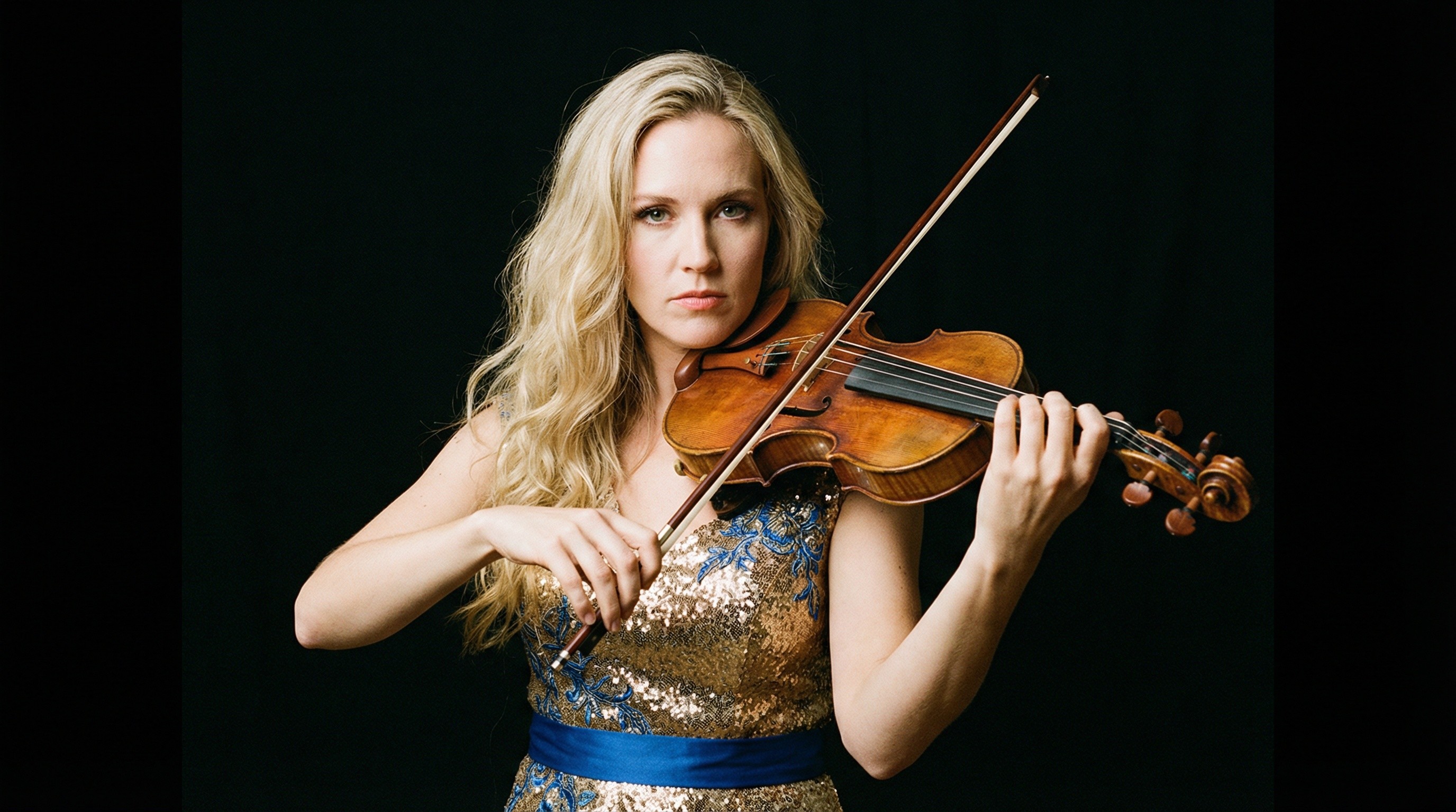 Blonde Woman in Gold and Blue Dress Playing Violin