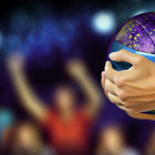 Close-up of a hand holding a colorful basketball