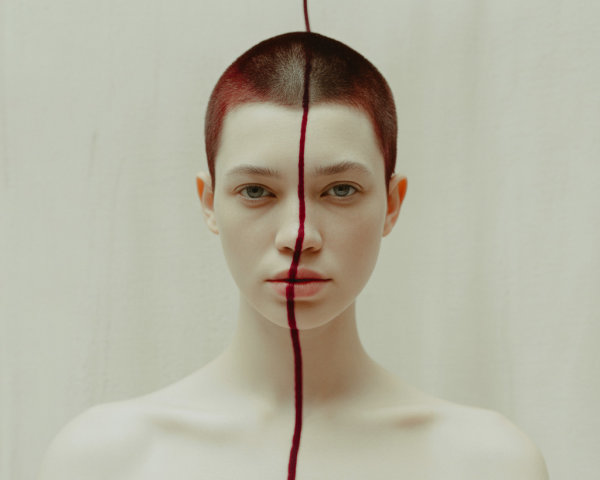 Portrait of a Person Highlighting Duality and Emotion