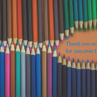 Colored Pencils Arranged in Three Rows with Tips Inward