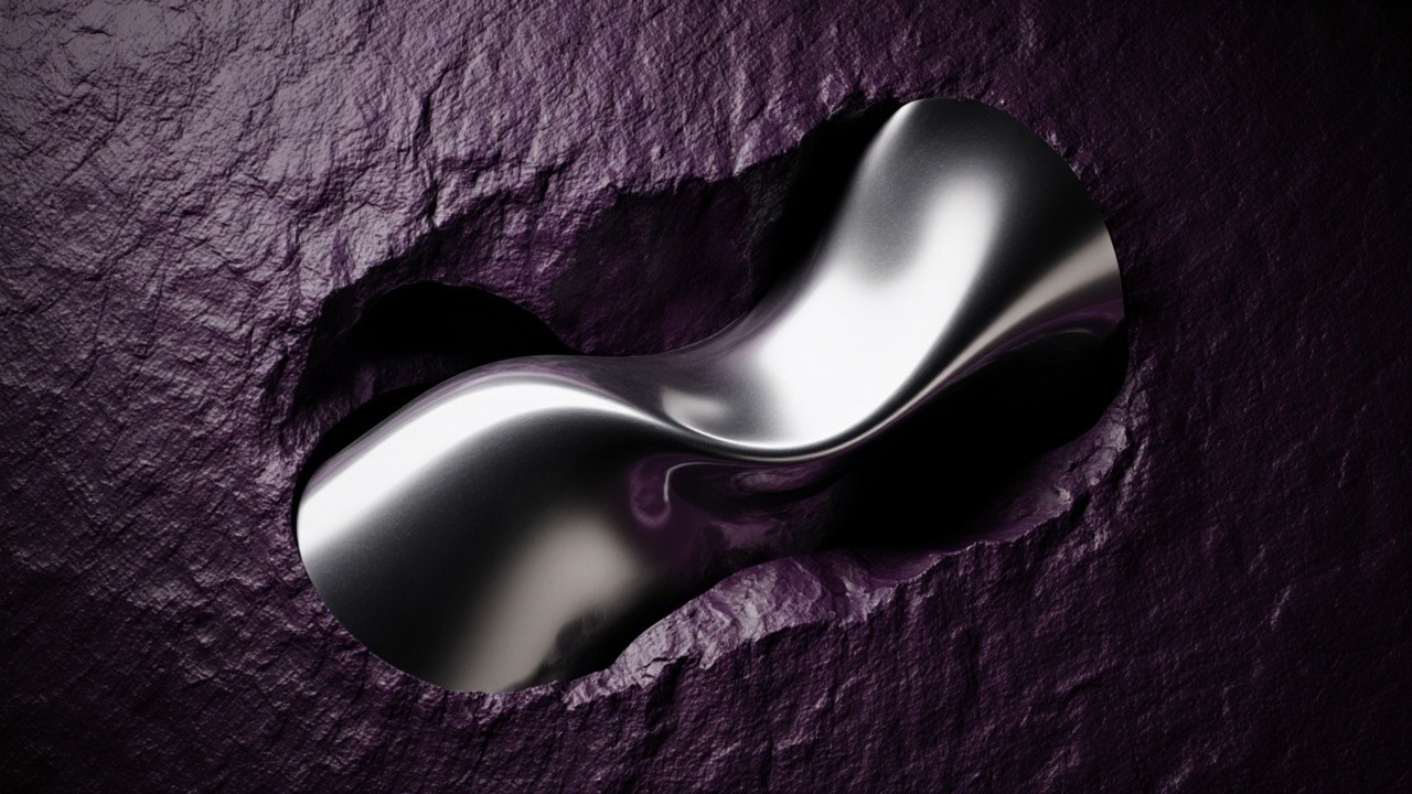 Polished Metallic Sculpture Against Textured Purple Wall