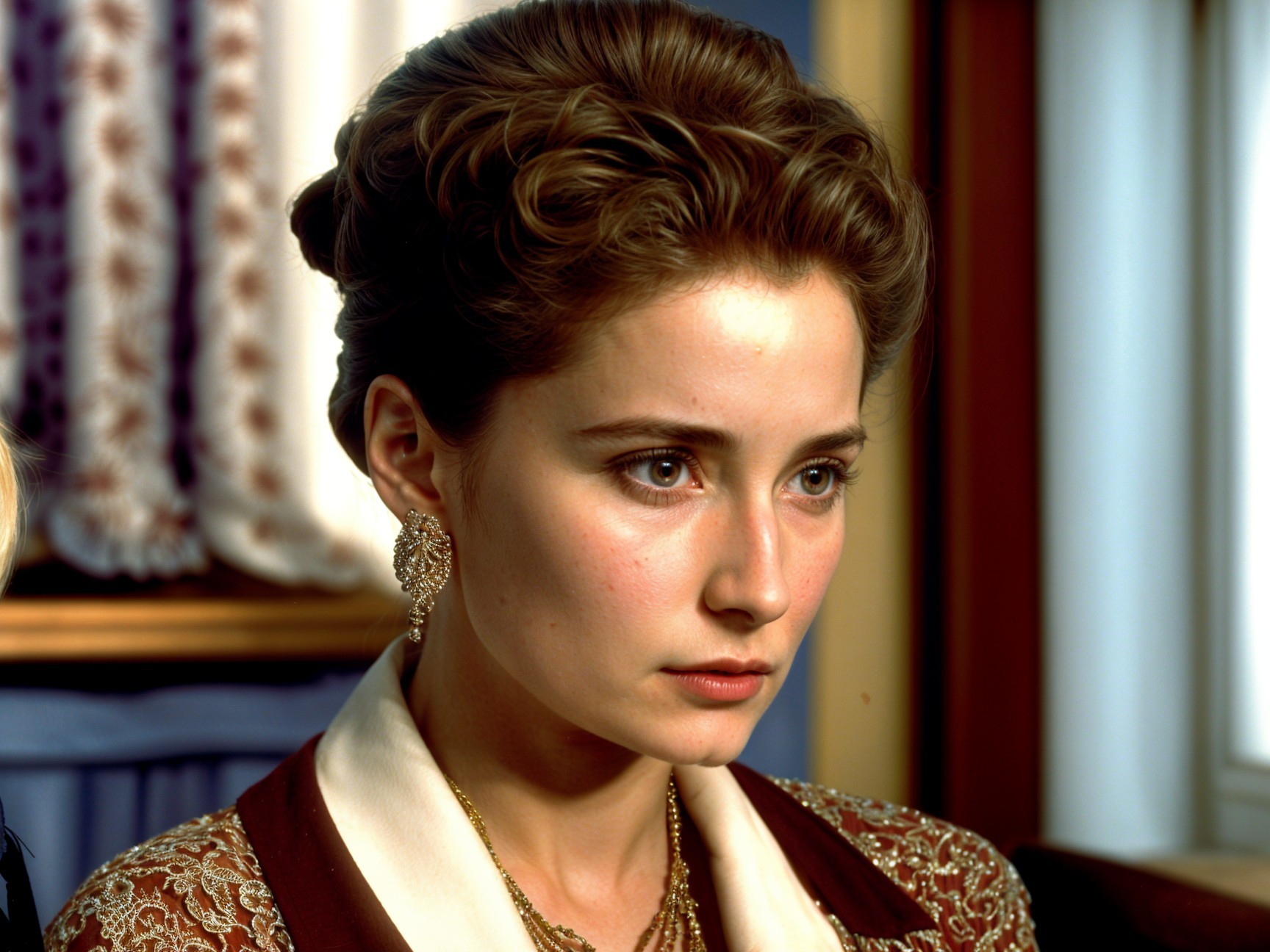 Young woman with elegant hair and ornate earrings