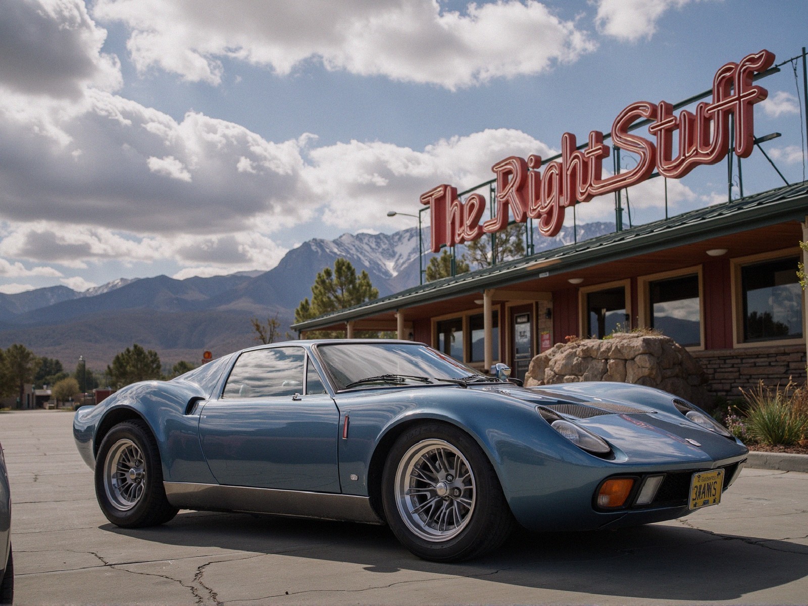 Vintage blue sports car parked near rustic diner
