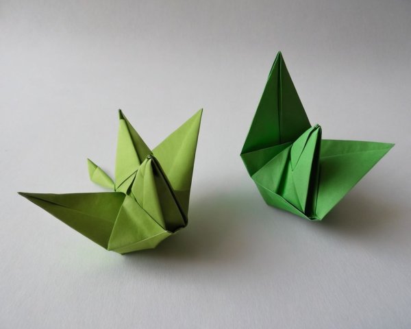 Intricately Folded Green Origami Butterflies Displayed