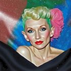 Portrait of a woman with vibrant green and pink hair