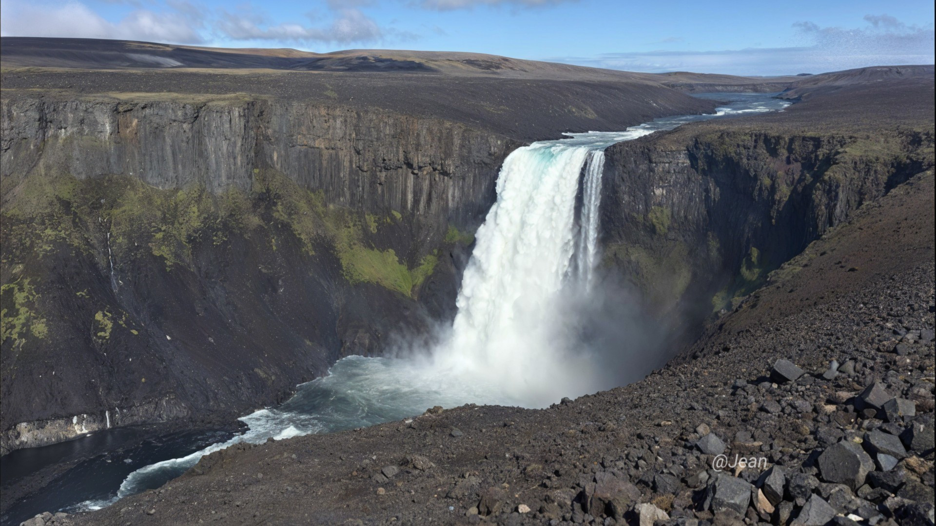 Majestic Waterfall in Rugged Canyon Landscape