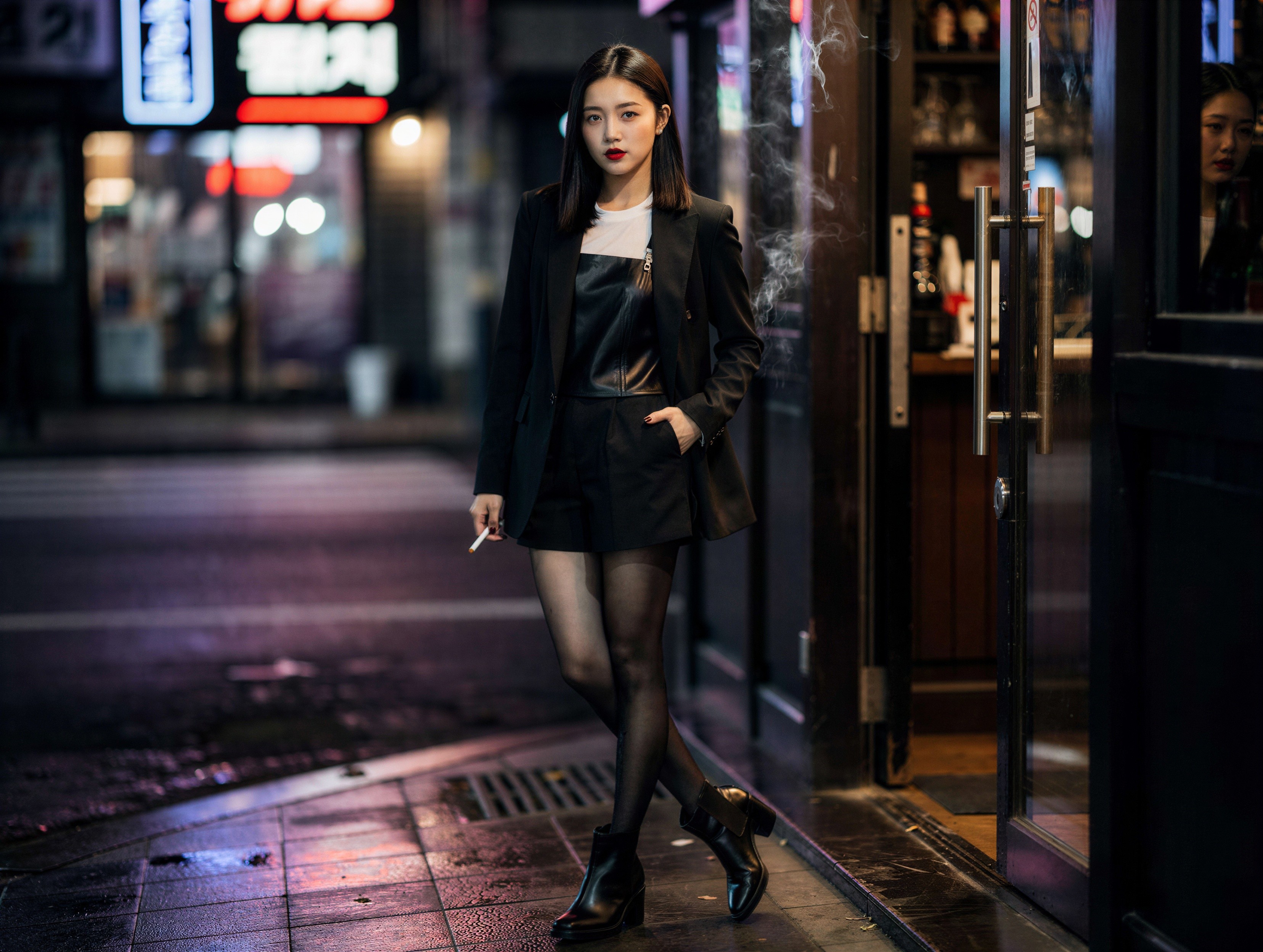 Elegant Young Woman in Urban Night Setting