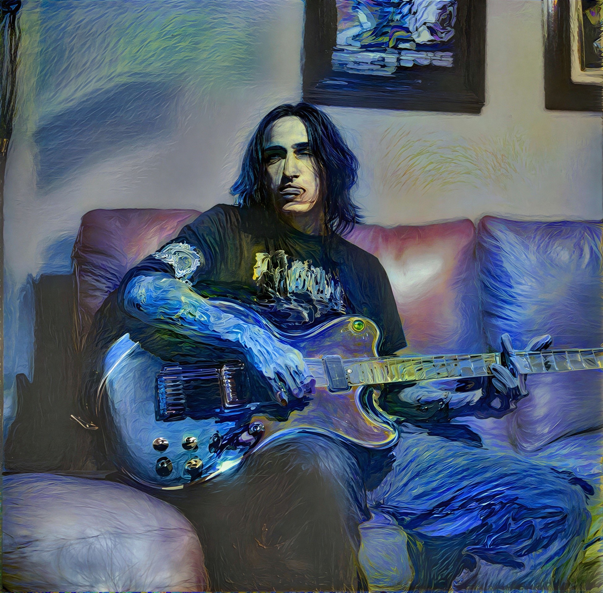 Man Playing Electric Guitar on Leather Couch