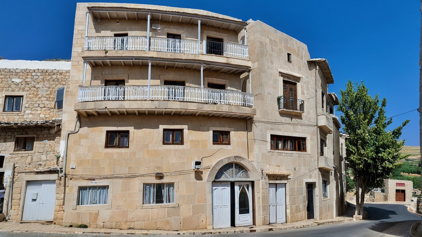 Charming Stone Building with Balconies and Arched Doorways