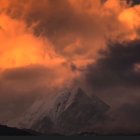Vibrant Sunset Over Snow-Capped Mountains Landscape